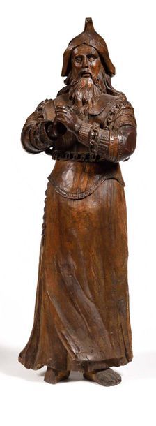 null Saint Adjutant de Vernon in carved walnut, carved back. Standing and hands joined,...