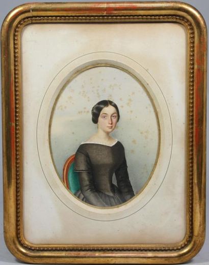 Ecole FRANCAISE vers 1840 Portrait de jeune fille Aquarelle à vue ovale, porte une...