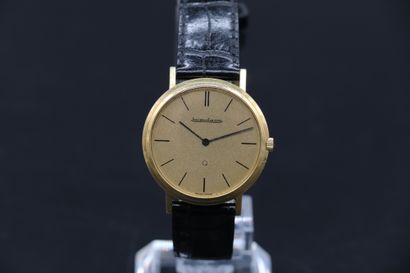 null Jaeger-LeCoultre in 18K yellow gold, Swiss of the 1980s, leather strap and signed...