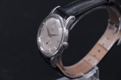  OMEGA (automatic ref. 2576-4), circa 1954 Steel sports watch with screw-down back...
