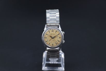 BREGUEL RING WATCH Circa 1960. Rare wristwatch with alarm function. Round solid...