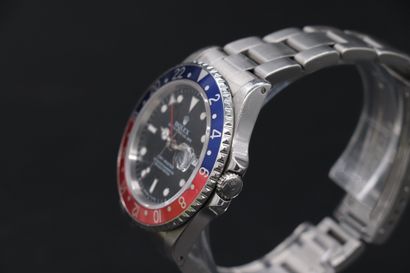 null ROLEX GMT-MASTER dite "Pepsi" réf. 16700 VERS 1990. Numérotée E 205870. Montre...