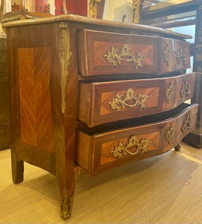 null Veneer and marquetry COMMODE opening in front by four drawers on three rows....