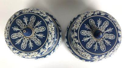 null WEDGWOOD Pair of cheese bells on their circular frames in enamelled biscuit...