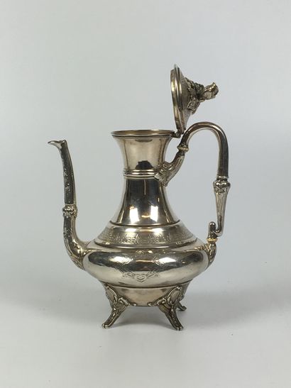 Silver teapot with quadripod base, the button-fristles....