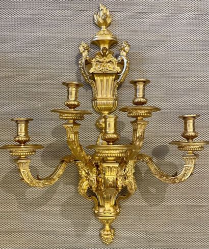 null 
An important pair of ormolu and chased bronze sconces with five moving light...