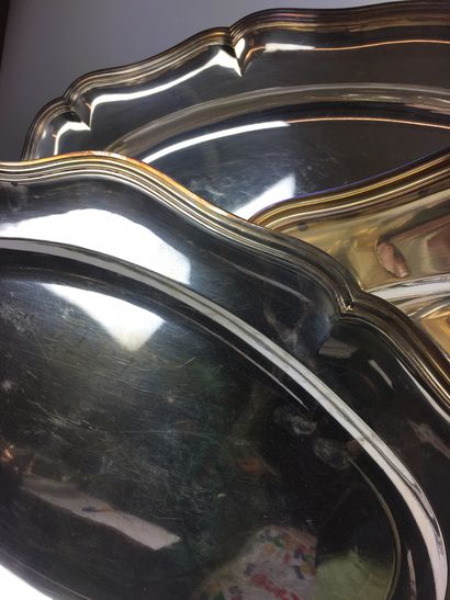 null Reunion of THREE SERVICE TRAYS in silver metal with a moving contour with threads....