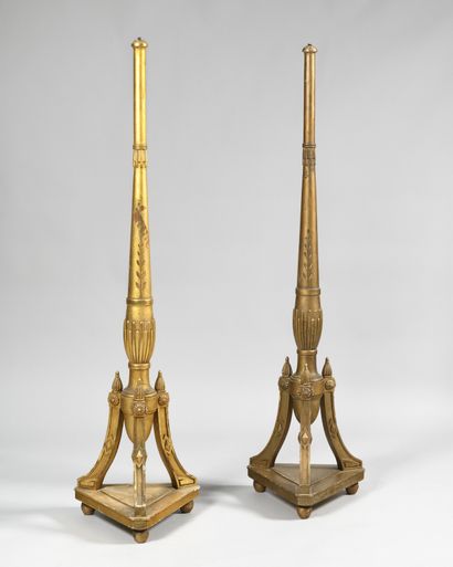 null WORK OF THE 1920's in neoclassical style Pair of moulded and gilded wooden lamps...