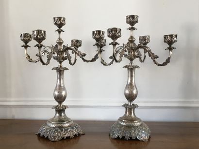 null 
PAIR OF SILVER CANDLES with four moving, leafy light arms and a central arm....
