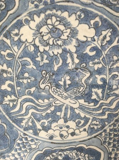 null SOUTH CHINA, SWATOW Large porcelain bowl decorated in blue under cover of two...