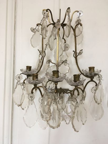 null Pair of ormolu and patinated bronze sconces, with five moving light arms holding...