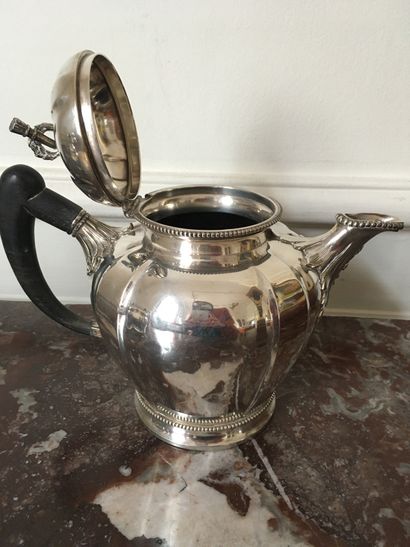 null TEA AND COFFEE SERVICE in silver, ebony handles, including a teapot, a coffee...