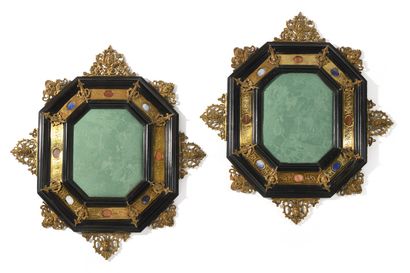 null Pair of octagonal frames in blackened wood decorated with engraved brass plates...