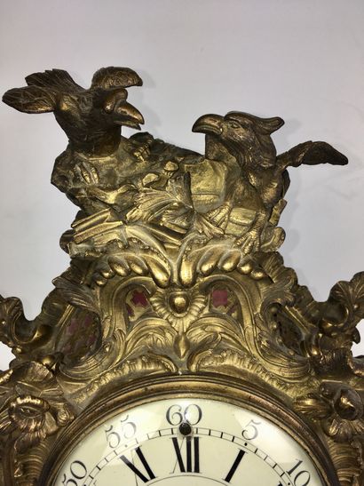 null CARTEL in chased and gilt bronze with rocaille decoration. Enamelled dial signed...