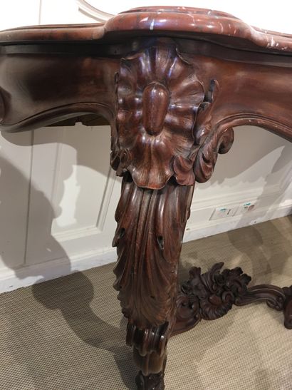 null WIDE CONSOLE in mahogany, moulded and sculpted, resting on a double console...