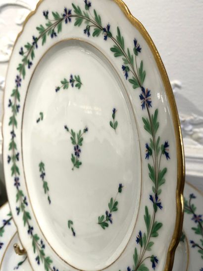 null LIMOGES Table service part in white pocelain with gold edging and cornflower...