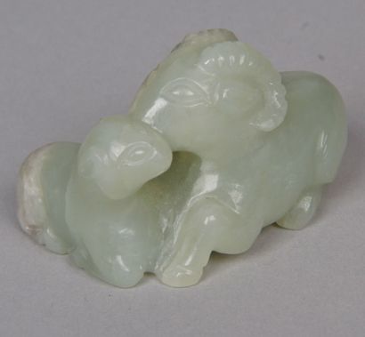 null CHINA, late 19th-20th century Small group in jadeite shaded with white, beige...
