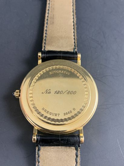 null BREGUET Jumping Hours, n° 2642B. Circa 1990. 18K yellow gold jumping hours wristwatch...