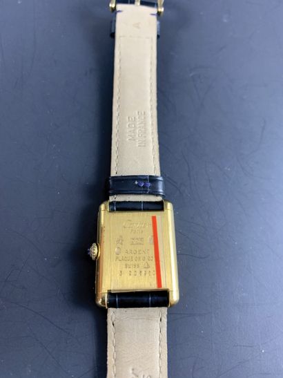 null CARTIER About 1960. Ref: 3201910. Lady's wristwatch in vermeil, tank case, signed...