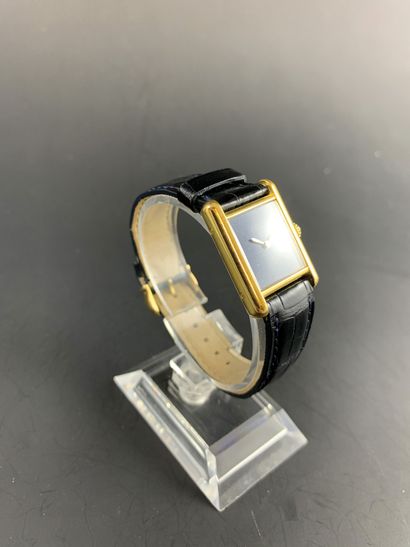null CARTIER About 1960. Ref: 3201910. Lady's wristwatch in vermeil, tank case, signed...