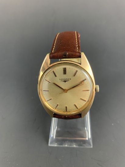 null LONGINES About 1970. Ref: 15691165. Gold-plated wristwatch, tonneau case, signed...