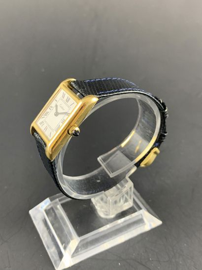 null CARTIER Tank Circa 1990. Ladies' wristwatch in 18K yellow gold, Tank case. Signed...