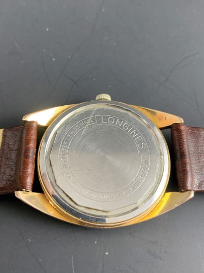 null LONGINES About 1970. Ref: 15691165. Gold-plated wristwatch, tonneau case, signed...