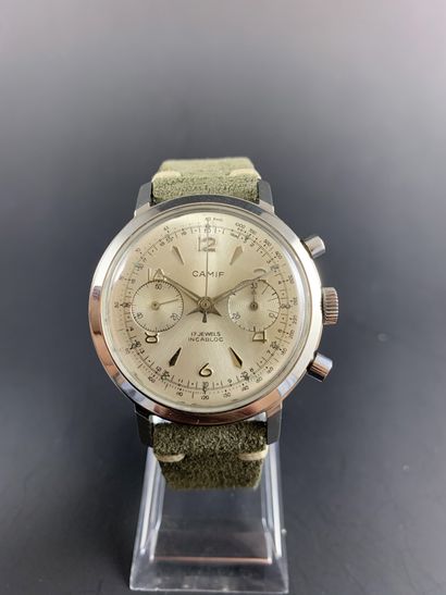 null CAMIF About 1960. Stainless steel chronograph, round case, silvered dial. Arabic...