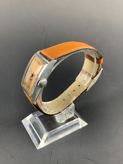 null LIP T18 About 1950. Stainless steel wristwatch, "tank" type case, bronze dial....