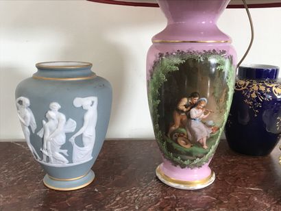 null Lot including : 

A Wedgwood style vase by Tharaud in Limoges

A vase mounted...