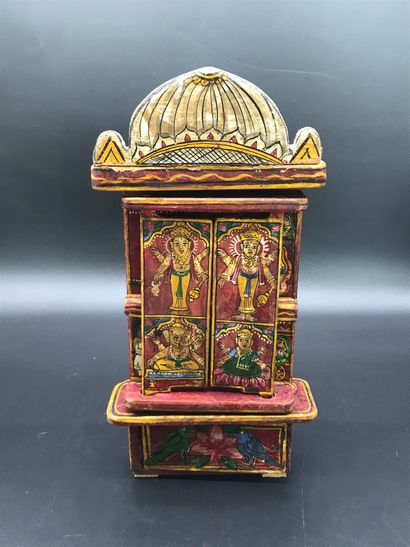 null INDIAN CABINET 

In painted and varnished wood opening with multiple doors and...