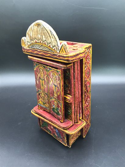 null INDIAN CABINET 

In painted and varnished wood opening with multiple doors and...