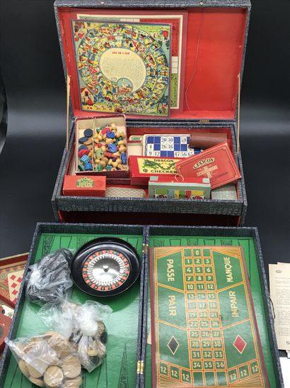 null Living room GAME BOX with roulette wheel

Containing multiple board games. 

Probably...