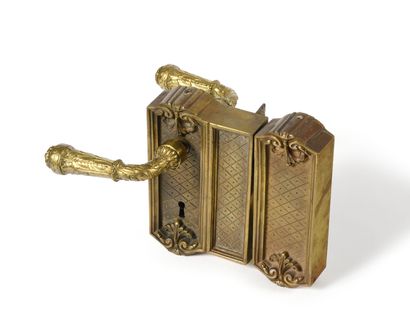 null Beautiful palace lock, in two parts, in chased gilt bronze, with foliage decoration....