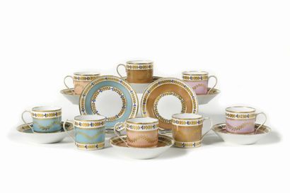 null Eight porcelain cups and saucers decorated with gilded leafy friezes on pink,...