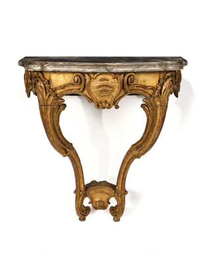 null Pair of carved and gilded oak console tables, decorated with rocaille in a cartouche,...