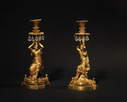 null Pair of ormolu, cut glass and rock crystal candlesticks, decorated with Turkish...