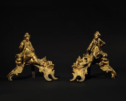 null Pair of gilt bronze TURKISH CHARACTERS, one smoking a pipe, resting on a rocaille...