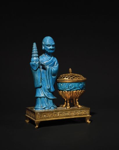null A Kangxi period Chinese porcelain and gilt bronze ENCRIER (restorations), the...