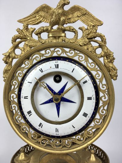 null An ormolu and chased bronze SQUELETTE CLOCK, the circular enamelled dial signed...