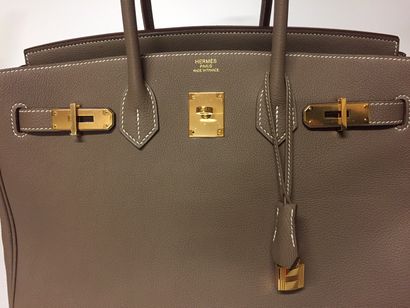 null HERMES Sac "Birkin" 35 cm en veau Togo Taupe, garniture en métal doré, tirette,...