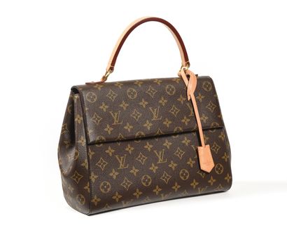 null LOUIS VUITTON Sac Cluny MM en toile Monogramme. Le rabat magnétique et la poche...