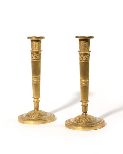 null Pair of ormolu and chased bronze corkscrews with guilloché decoration, arcatures,...