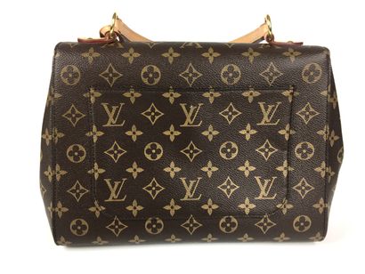 null LOUIS VUITTON Sac Cluny MM en toile Monogramme. Le rabat magnétique et la poche...