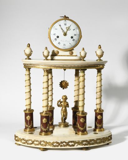 An important white marble and gilt bronze...