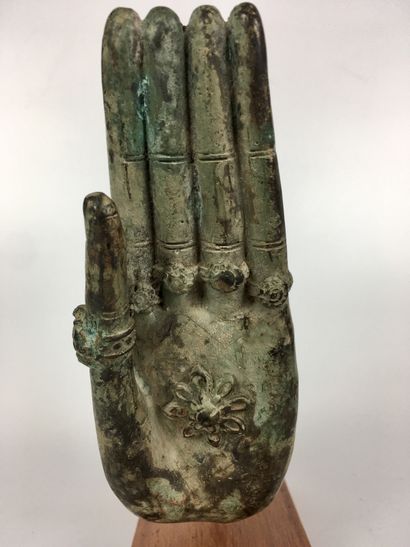 null THAILAND Bronze Buddha hand with green-brown patina, the fingers wearing rings....