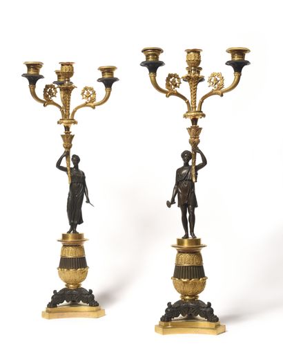 A PAIR OF CANDELABRES in gilt and patinated...
