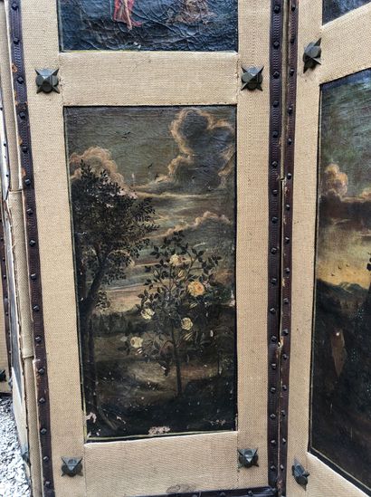 null PARAVENT à cinq volets ornés de dix toiles à décor de paysages flamands du XVIIIe...