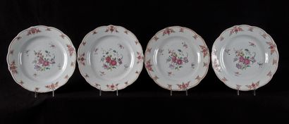 null COMPAGNIE DES INDES. Set of four porcelain plates with polychrome decoration...