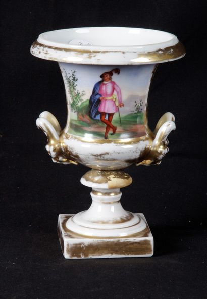 null PORCELAIN OF PARIS. Medici vase with gilded and polychrome decoration of character...